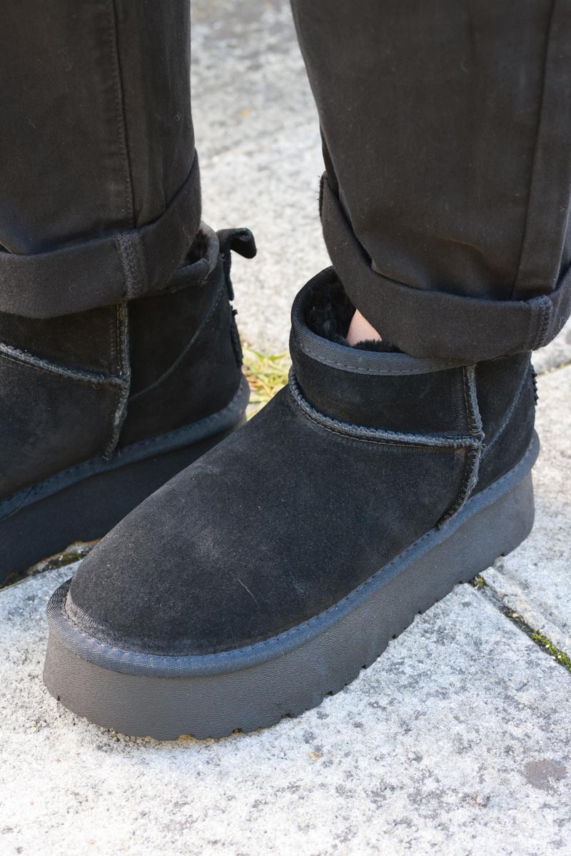 Bottes noires basses en cuir fourrées à plateforme