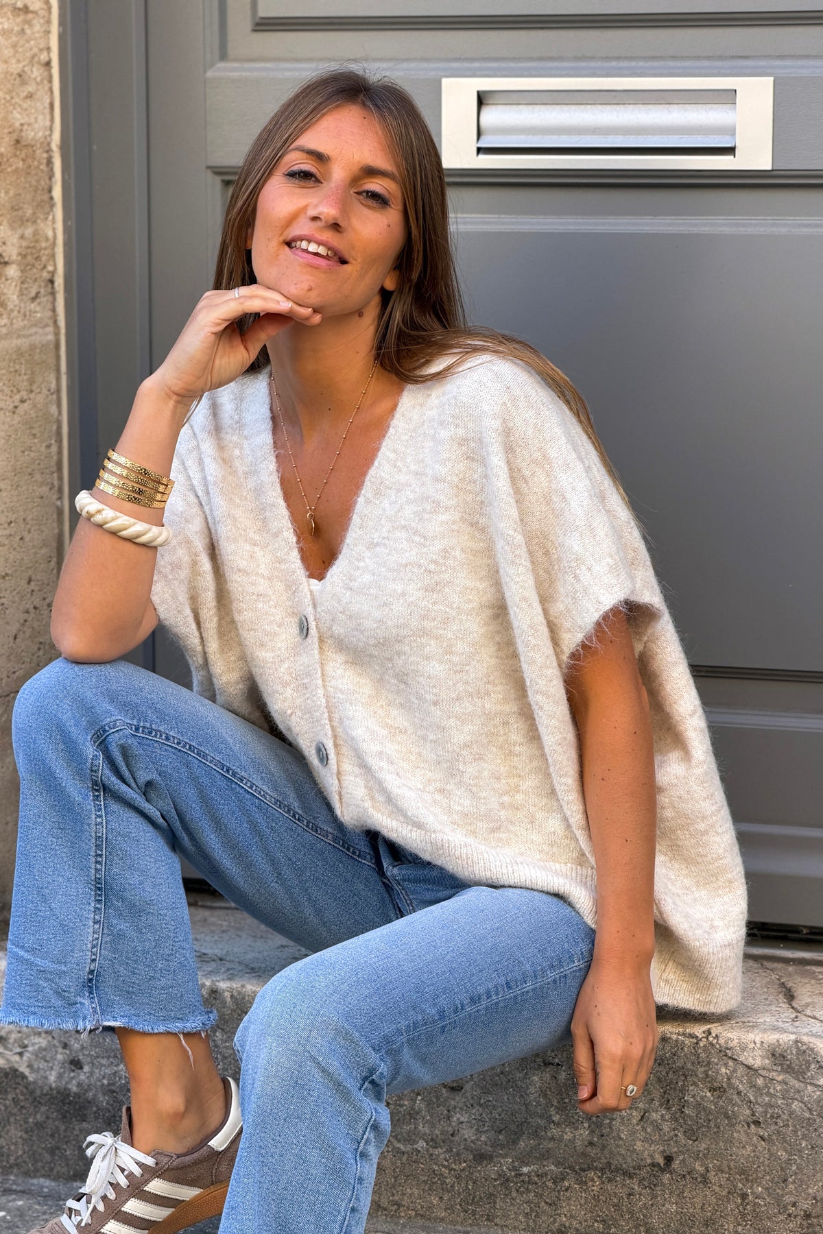 Gilet sans manches beige coupe loose en maille chinée boutons nacrés