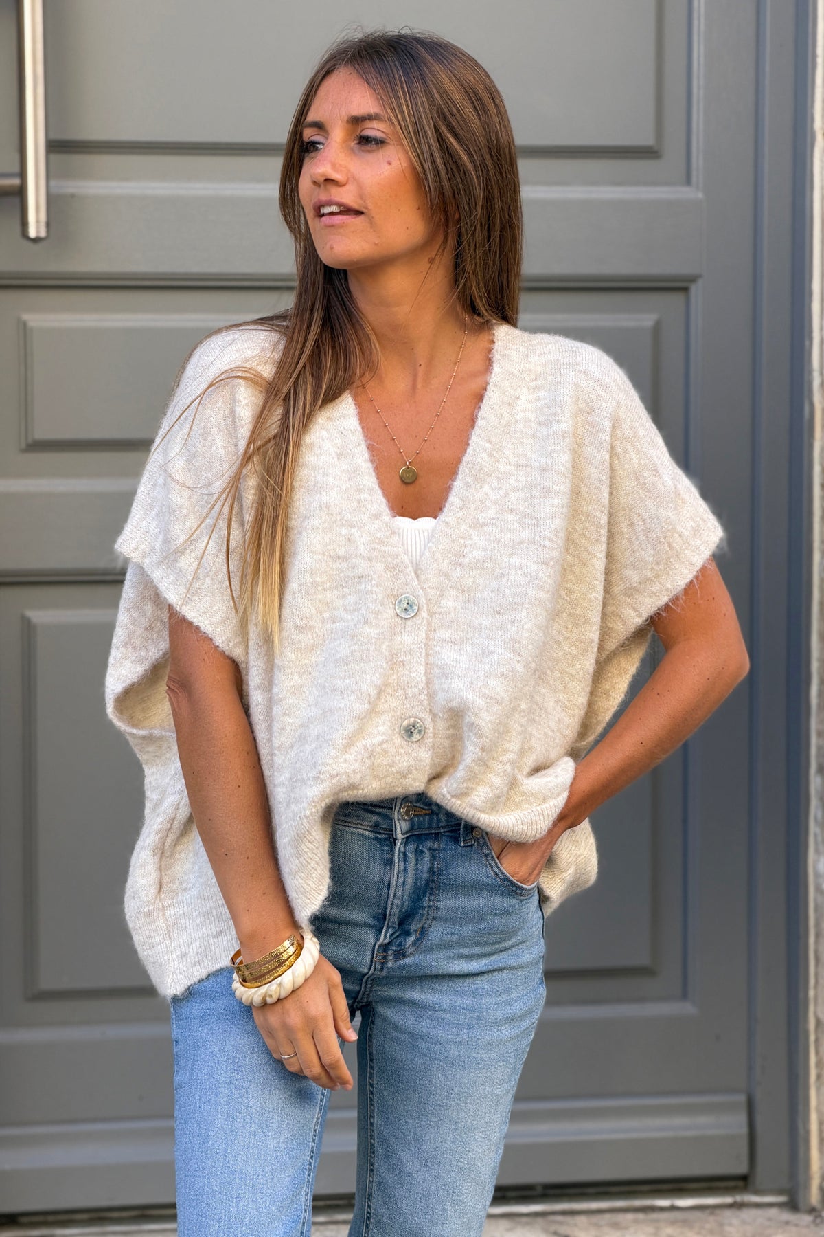 Gilet sans manches beige coupe loose en maille chinée boutons nacrés