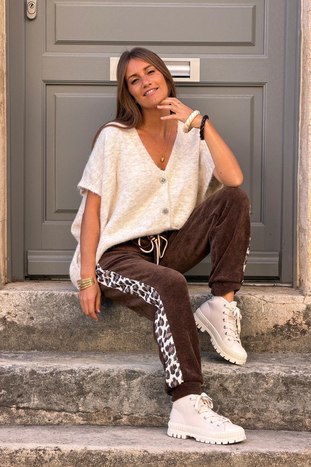 Gilet sans manches beige coupe loose en maille chinée boutons nacrés