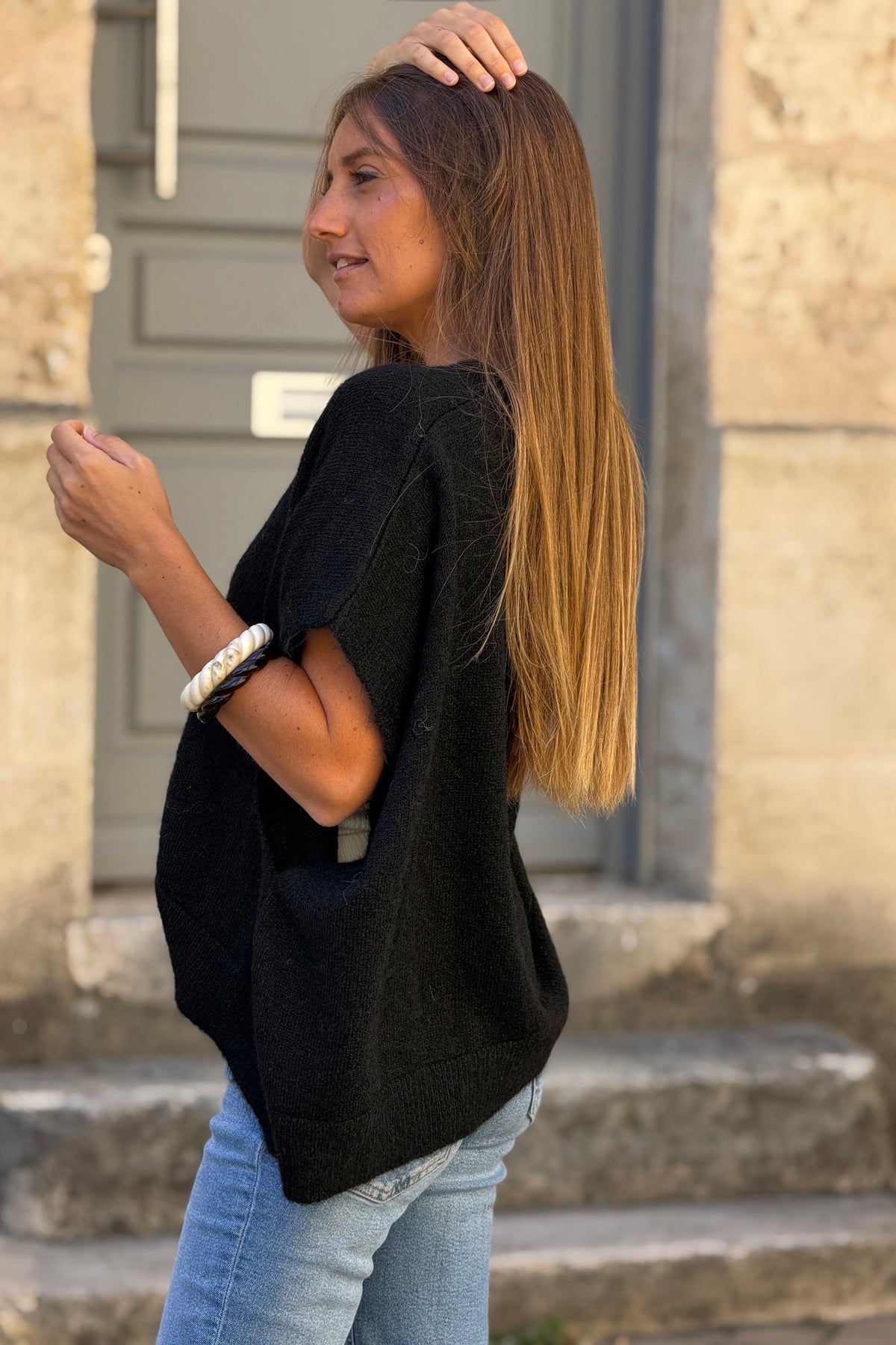 Gilet sans manches noir coupe loose en maille chinée boutons nacrés