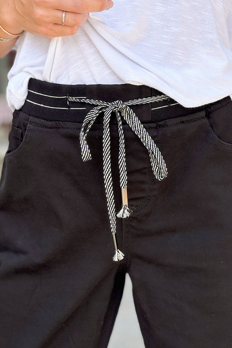Pantalon noir stretch droit large ceinture élastique liseré brillant