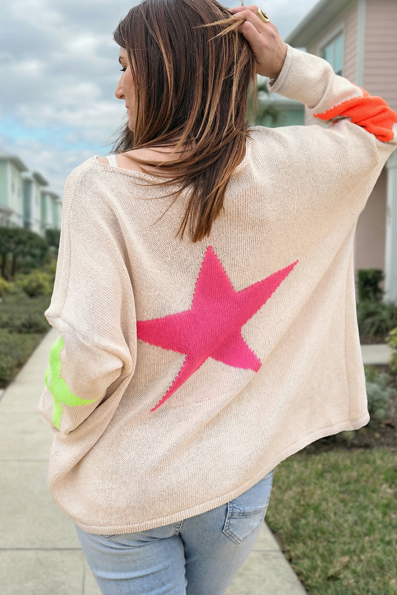 Beige knit sweater with colourful stars