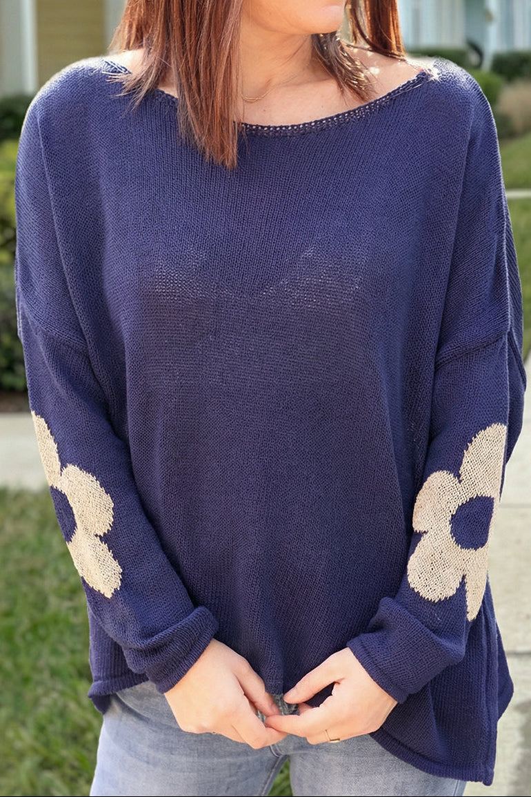 Jersey ancho de punto de algodón azul marino con flores doradas en la espalda y manga con cuello barco