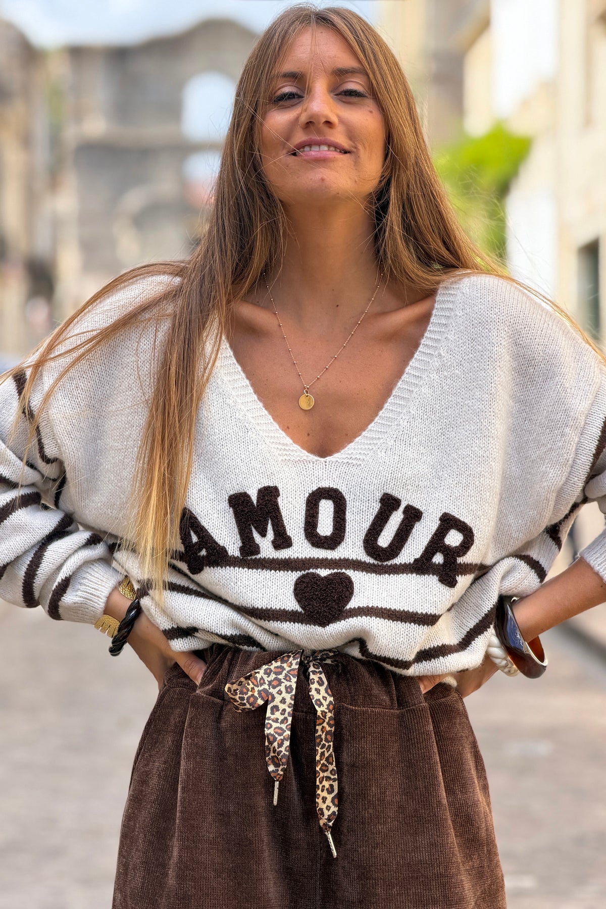 Off white and Brown striped sweater with amour in boucle