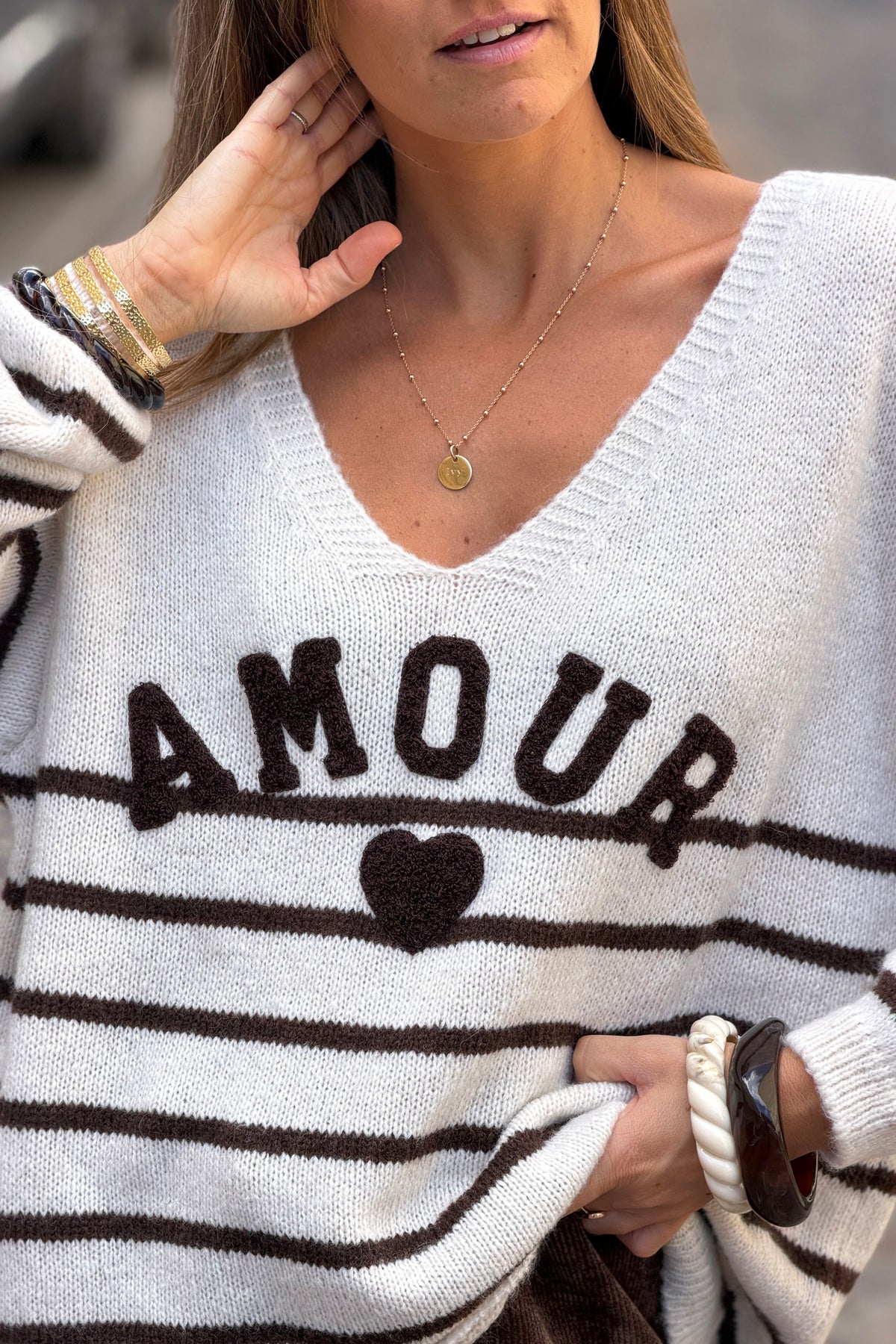 Off white and Brown striped sweater with amour in boucle
