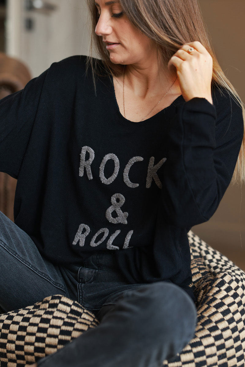 Suéter de rizo negro de jersey suave con efecto rock and roll