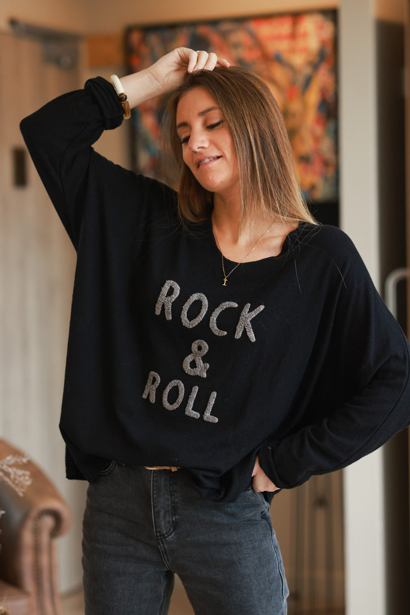 Suéter de rizo negro de jersey suave con efecto rock and roll