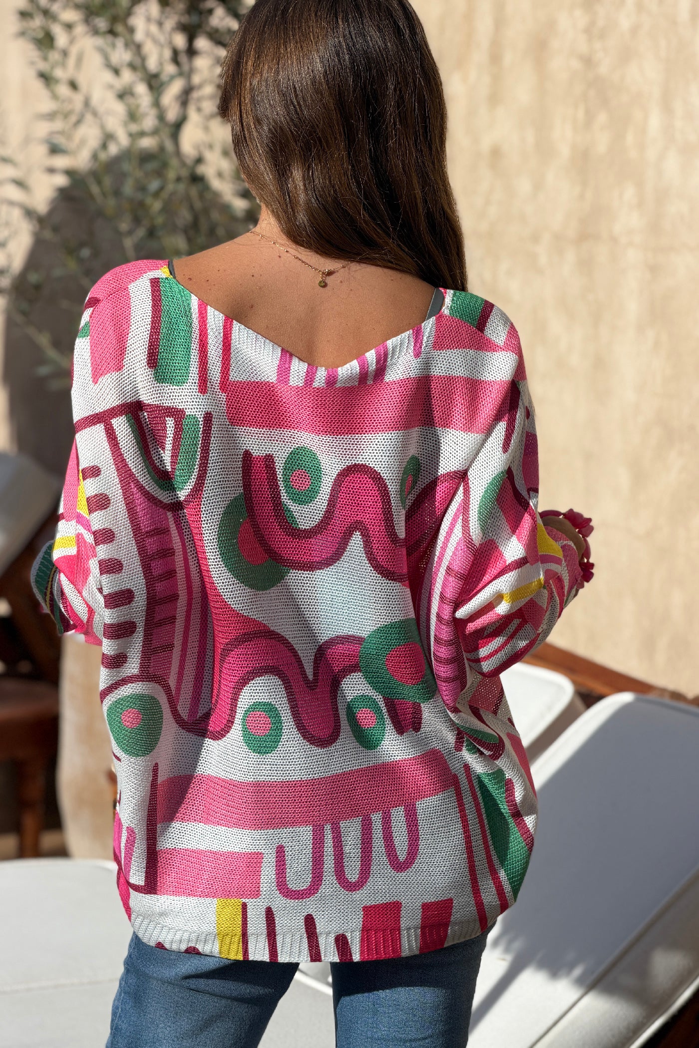 Pull petite maille imprime graphique abstrait tons rose manches chauve-souris