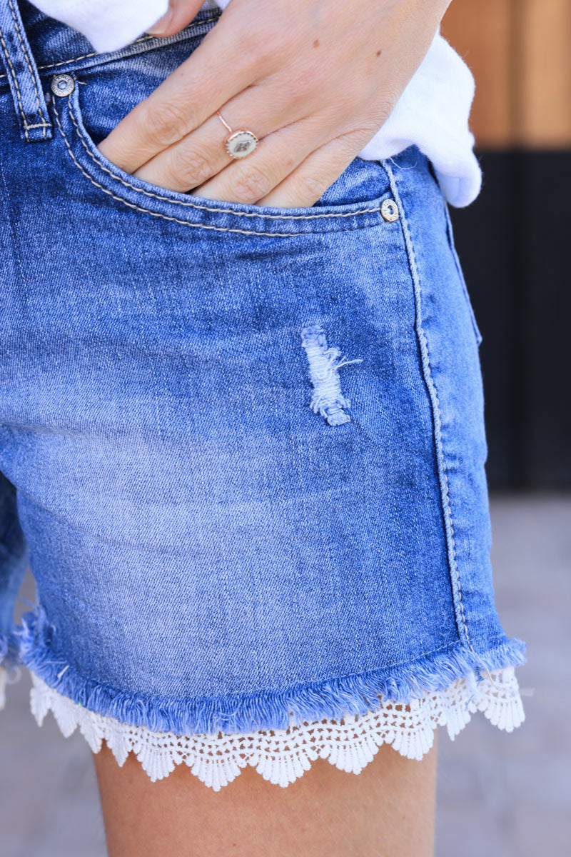 Denim jean light washed shorts with lace hem
