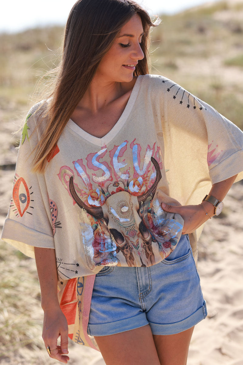 Top large beige brillant imprimé Rise Up tête de buffle et symboles colorés