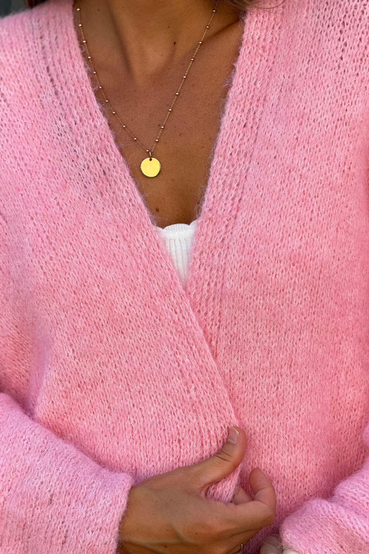 Gilet rose chiné en maille coupe loose manches chauve-souris trois-quarts