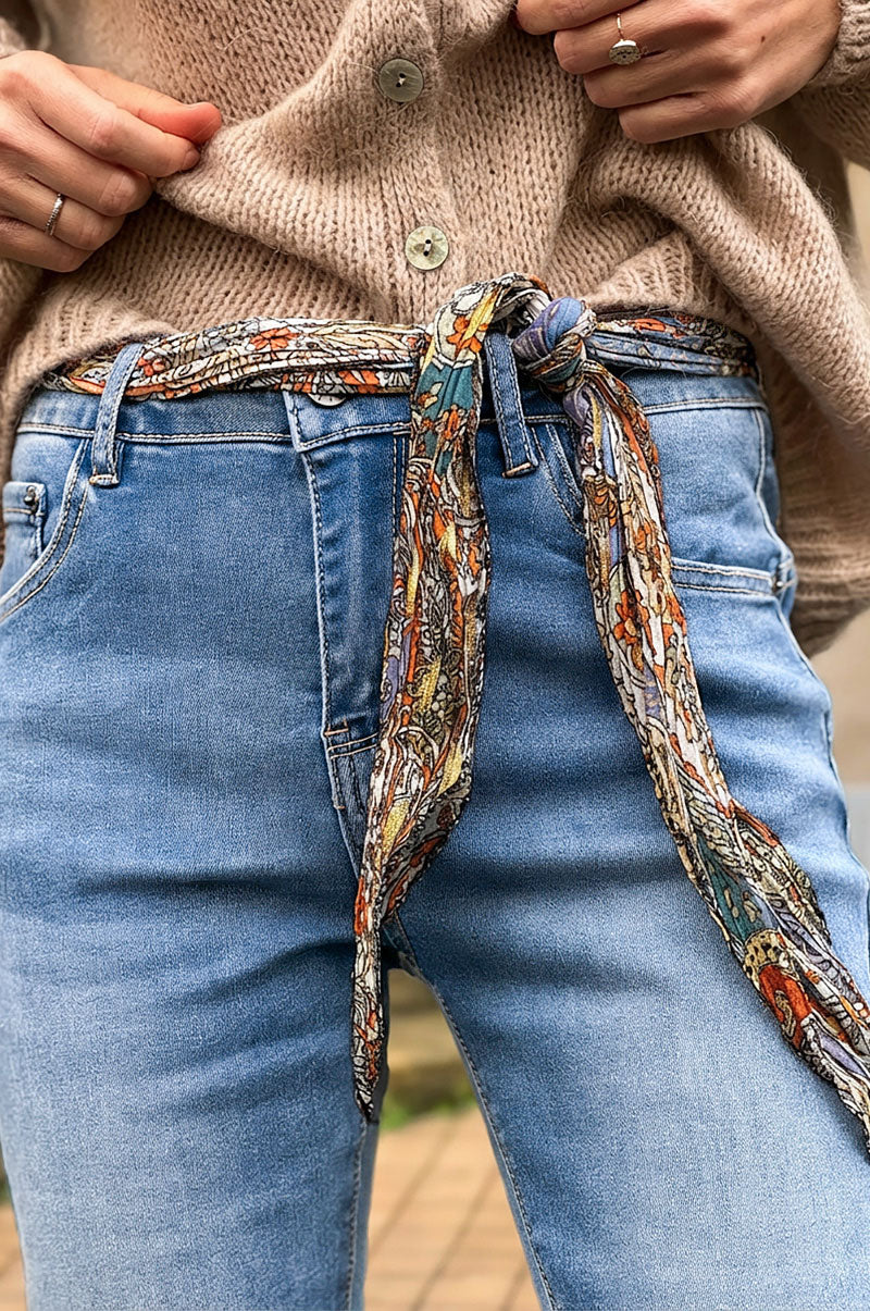 Medium Wash Sandblasted Skinny Jeans