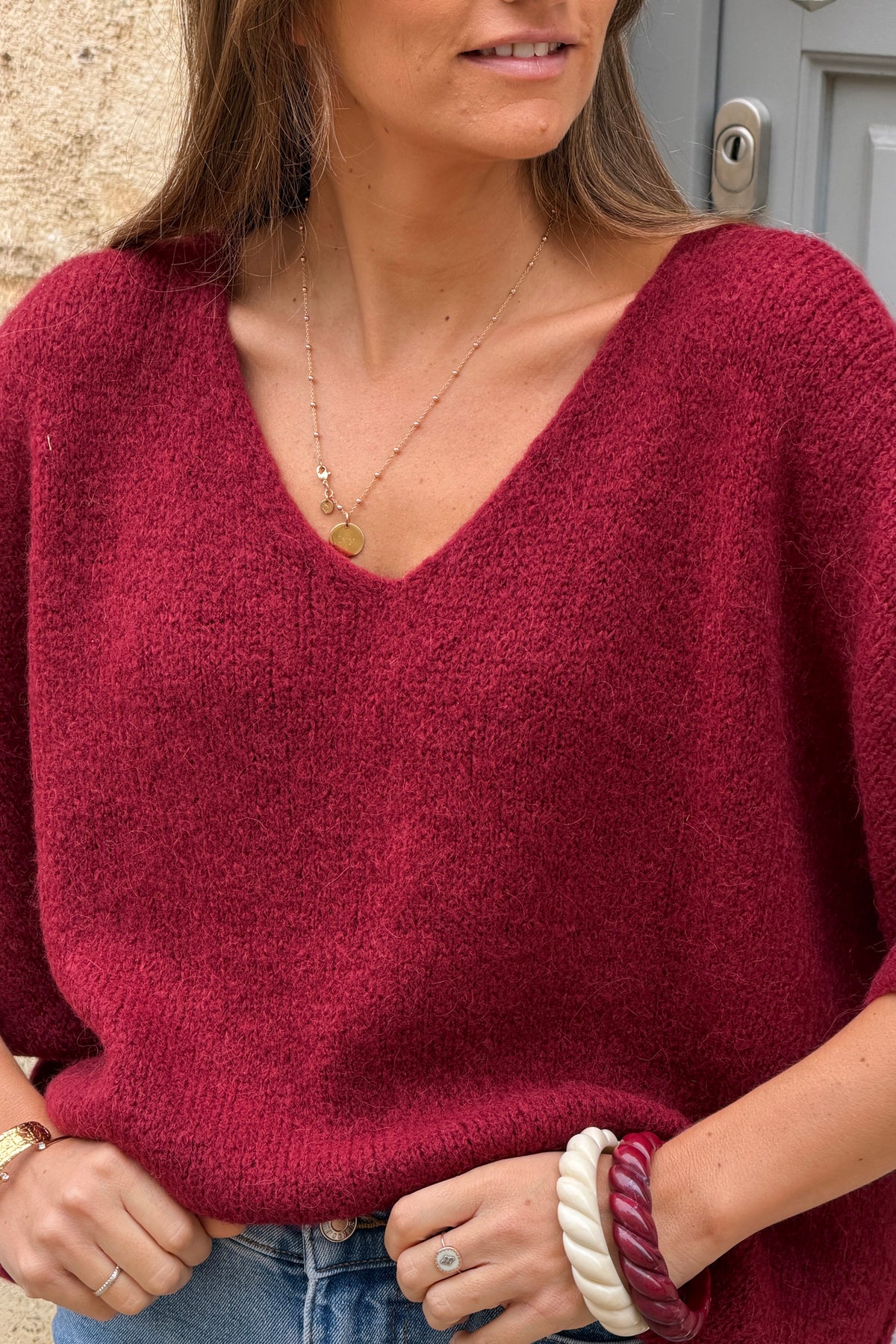 Pull doux en maille alpaga bordeaux manches chauve-souris col v