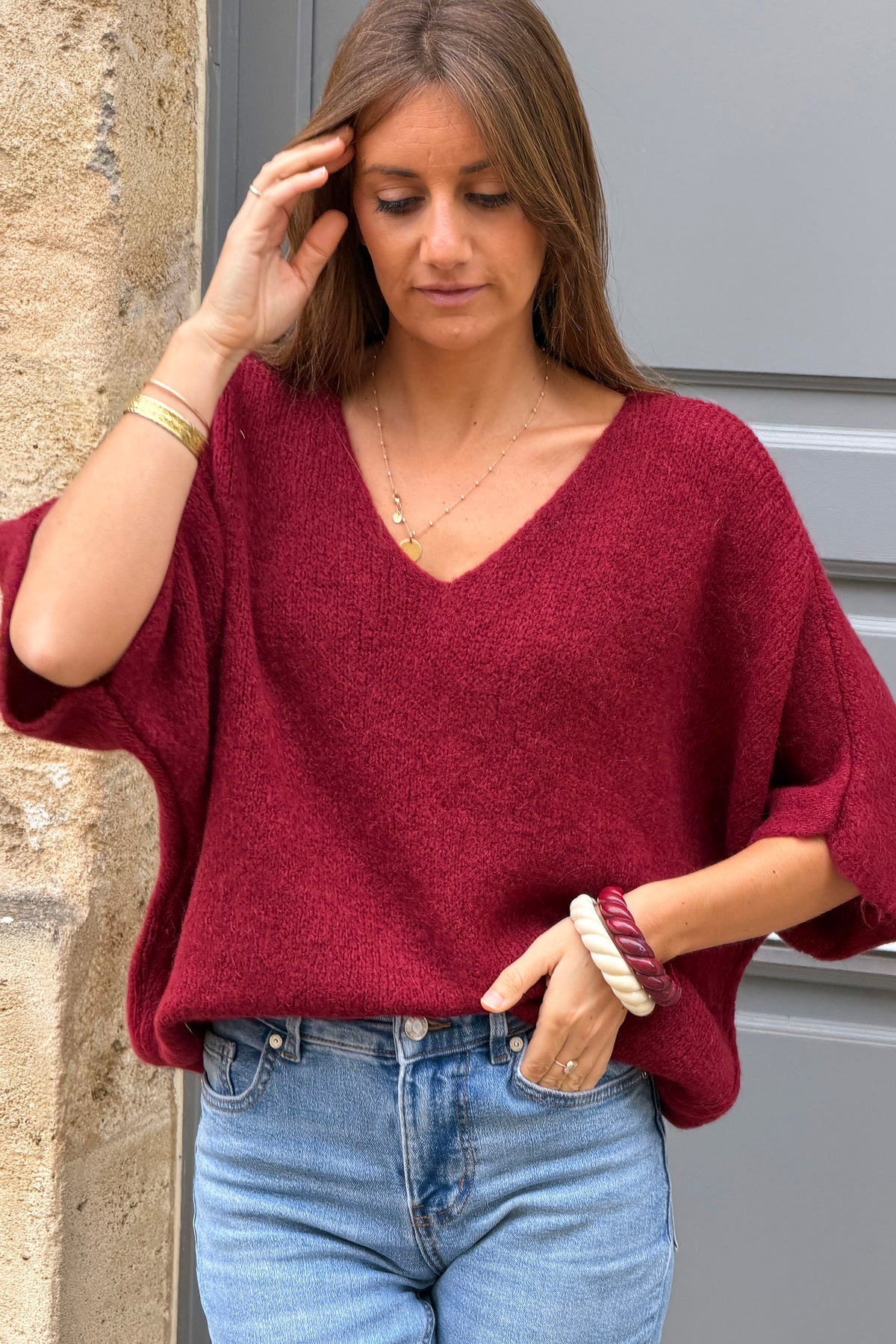 Pull doux en maille alpaga bordeaux manches chauve-souris col v