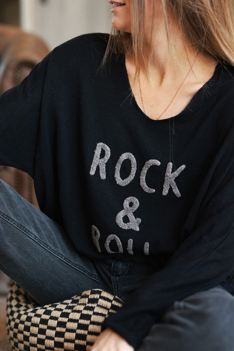 Suéter de rizo negro de jersey suave con efecto rock and roll