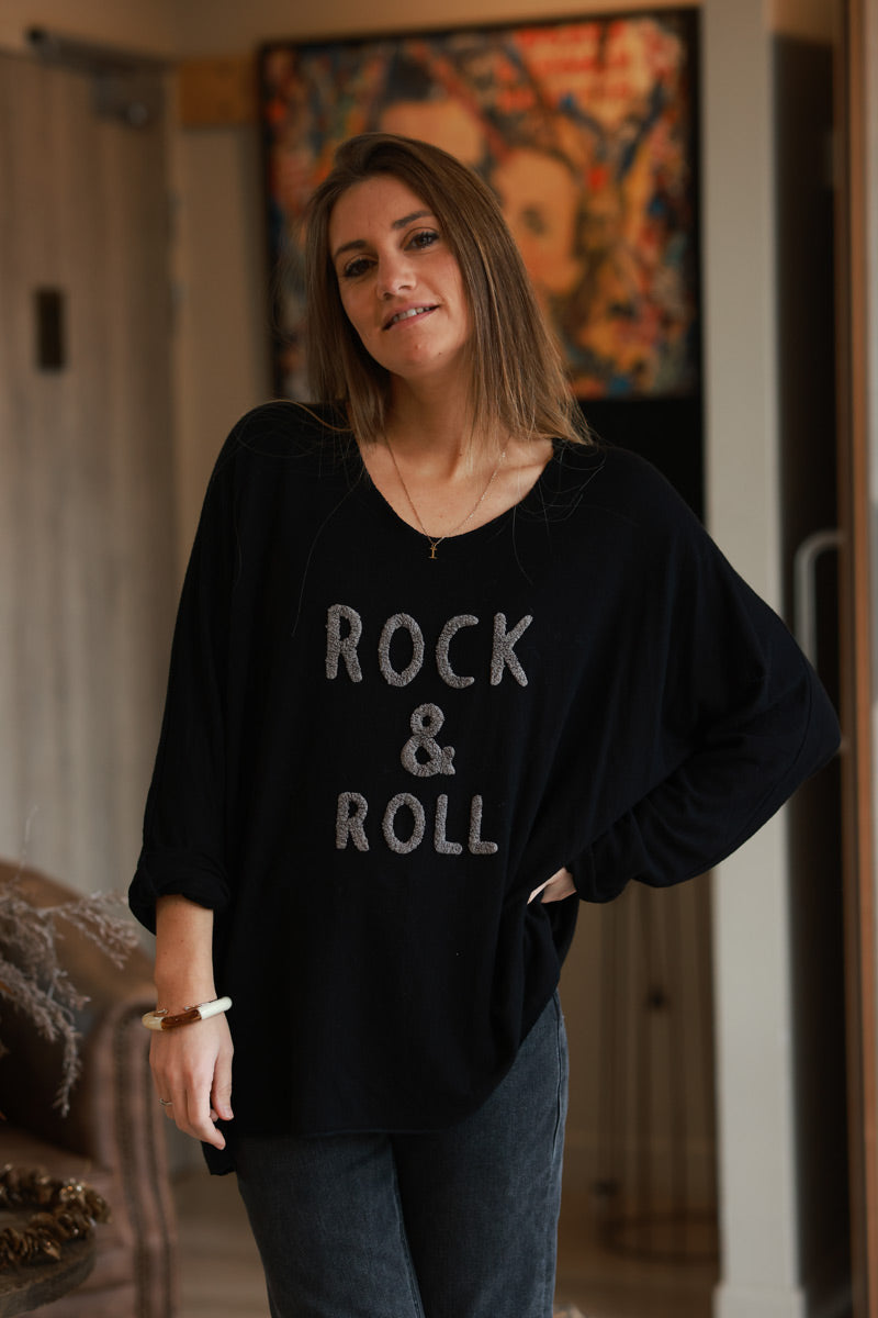 Suéter de rizo negro de jersey suave con efecto rock and roll