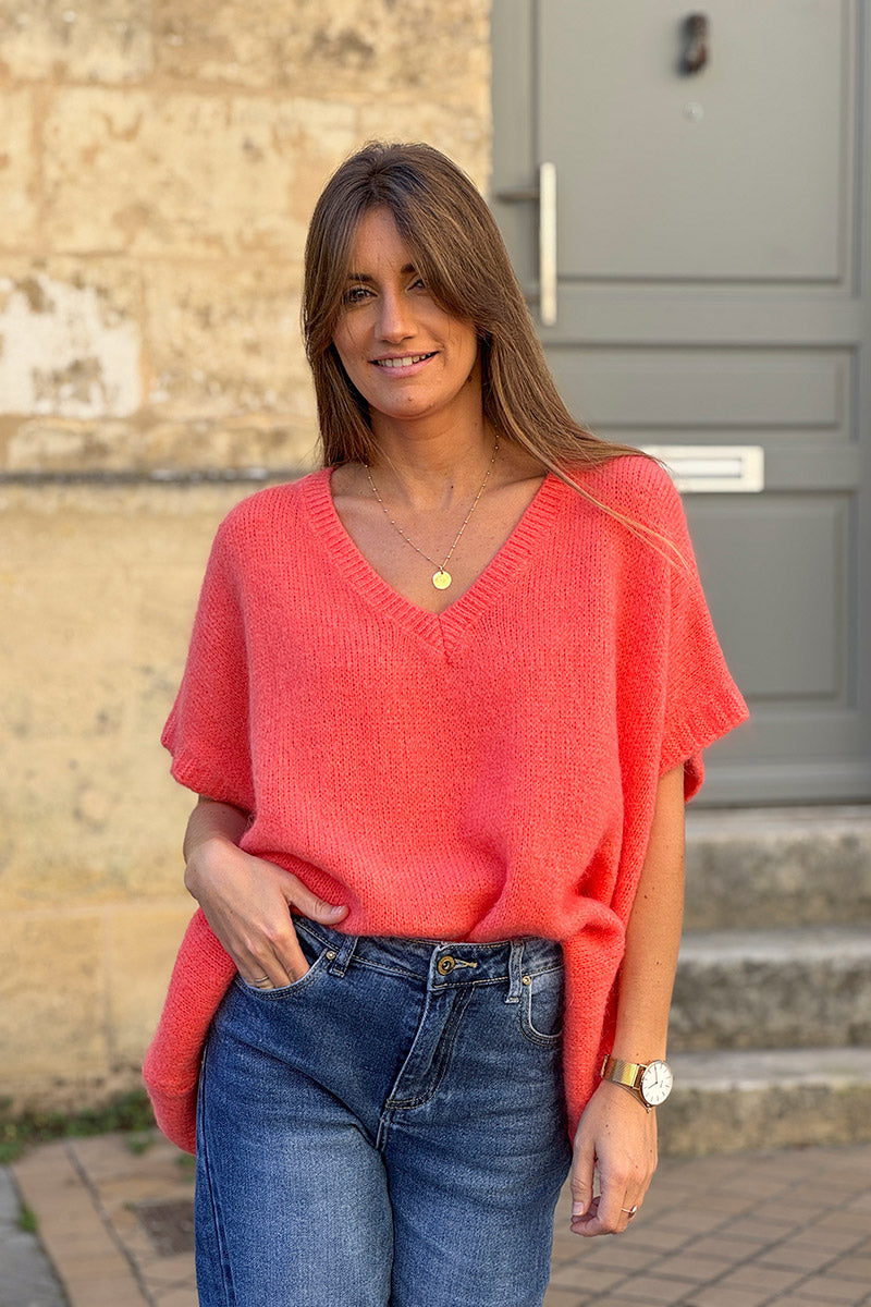 Suéter de mohair coral extragrande, esponjoso y sin mangas con cuello en V acanalado