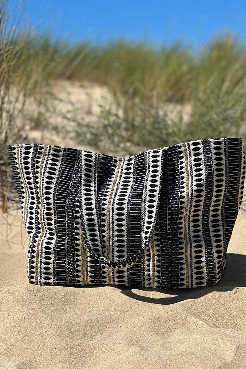 Bolso tote de algodón con efecto piqué y bordados en negro y dorado