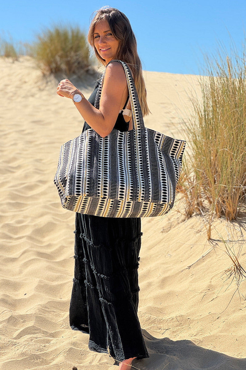 Bolso tote de algodón con efecto piqué y bordados en negro y dorado