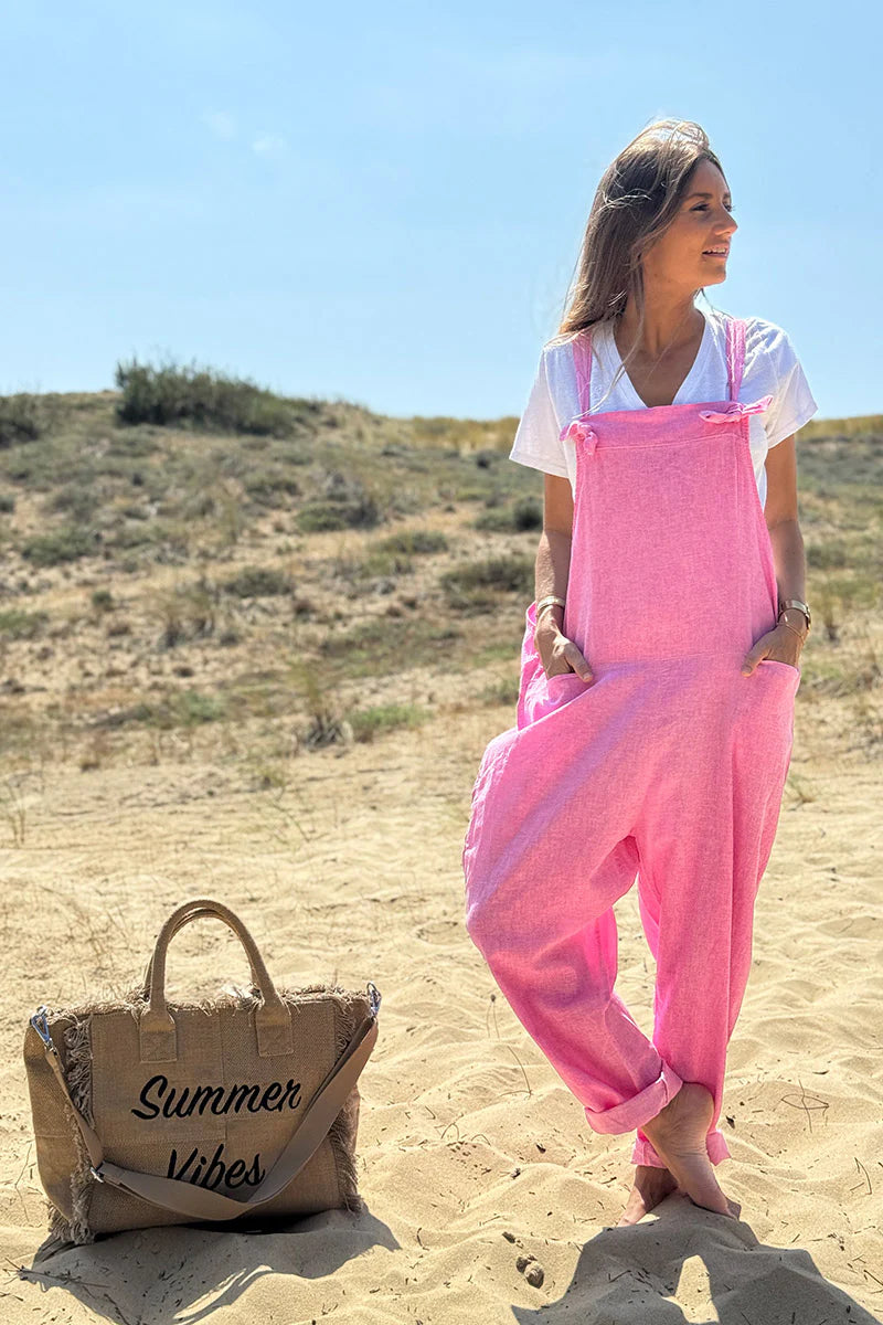 Peto fluido rosa, mitad algodón, mitad lino, con tirantes con lazo