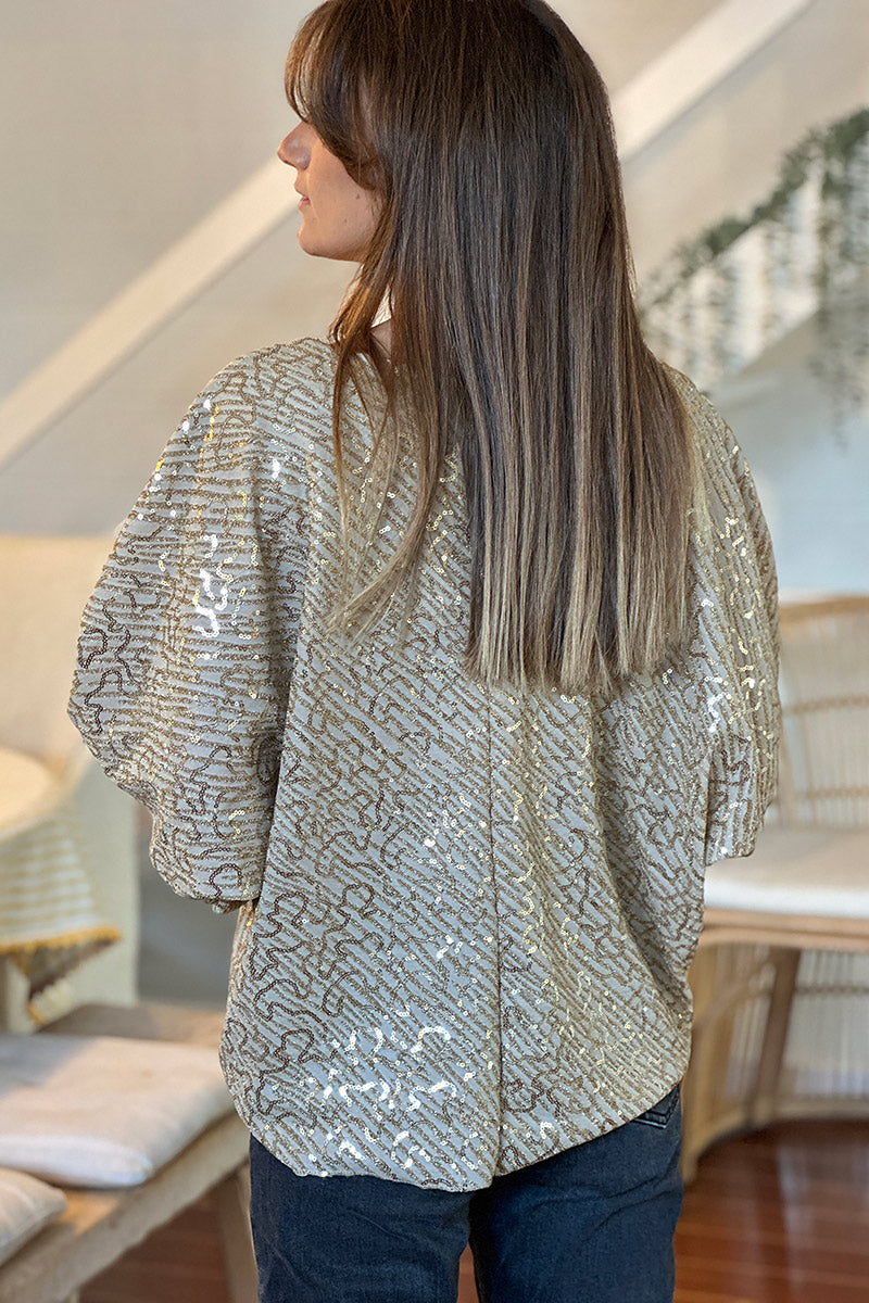 Top beige à sequins dorés à nouer manches chauve souris