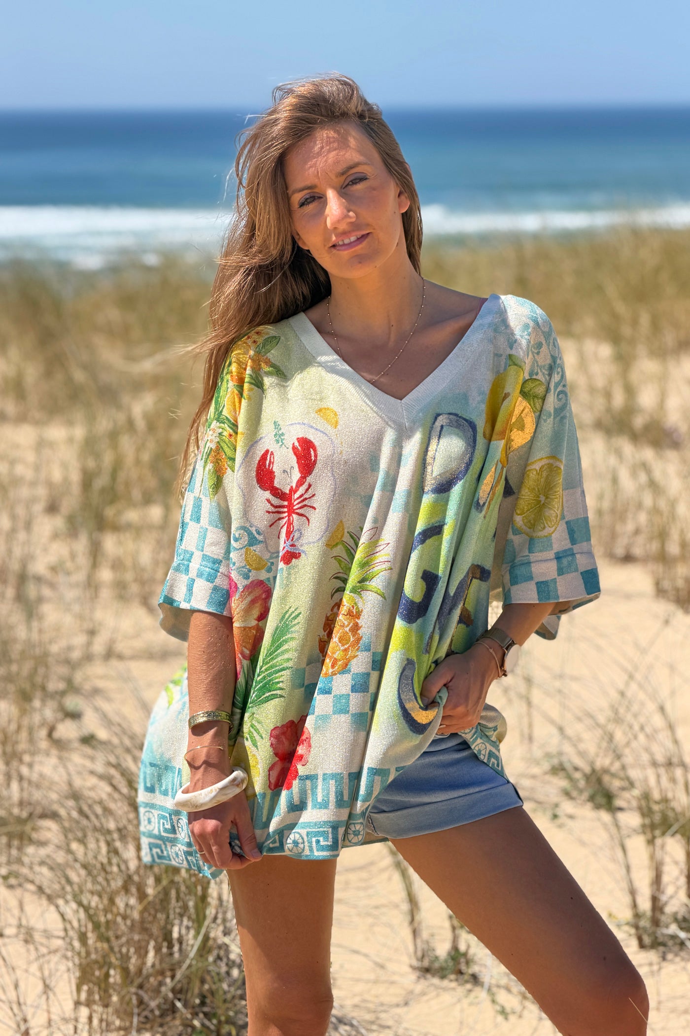 Cream “Don’t Give Up” Glitter Knit Tunic
