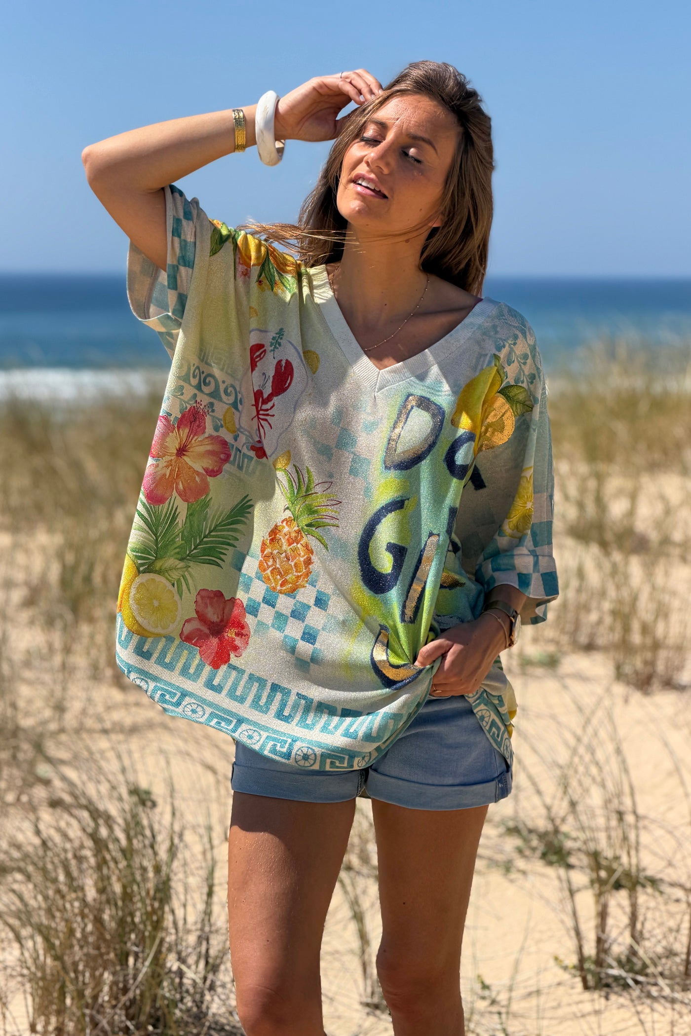 Cream “Don’t Give Up” Glitter Knit Tunic
