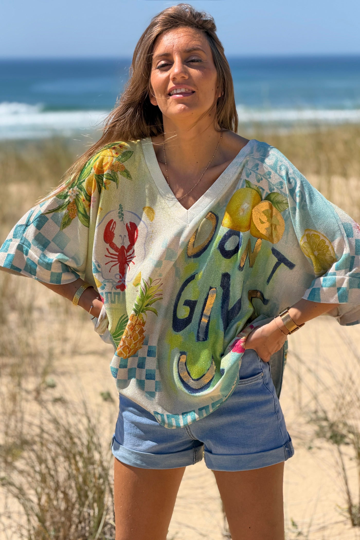 Cream “Don’t Give Up” Glitter Knit Tunic
