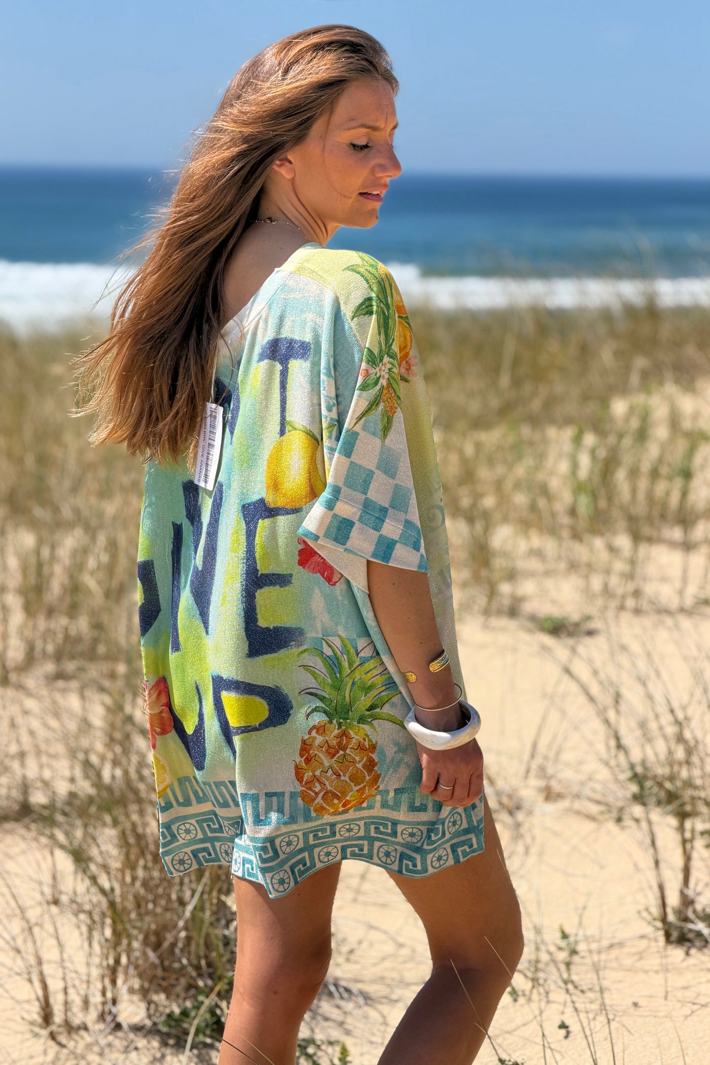Cream “Don’t Give Up” Glitter Knit Tunic
