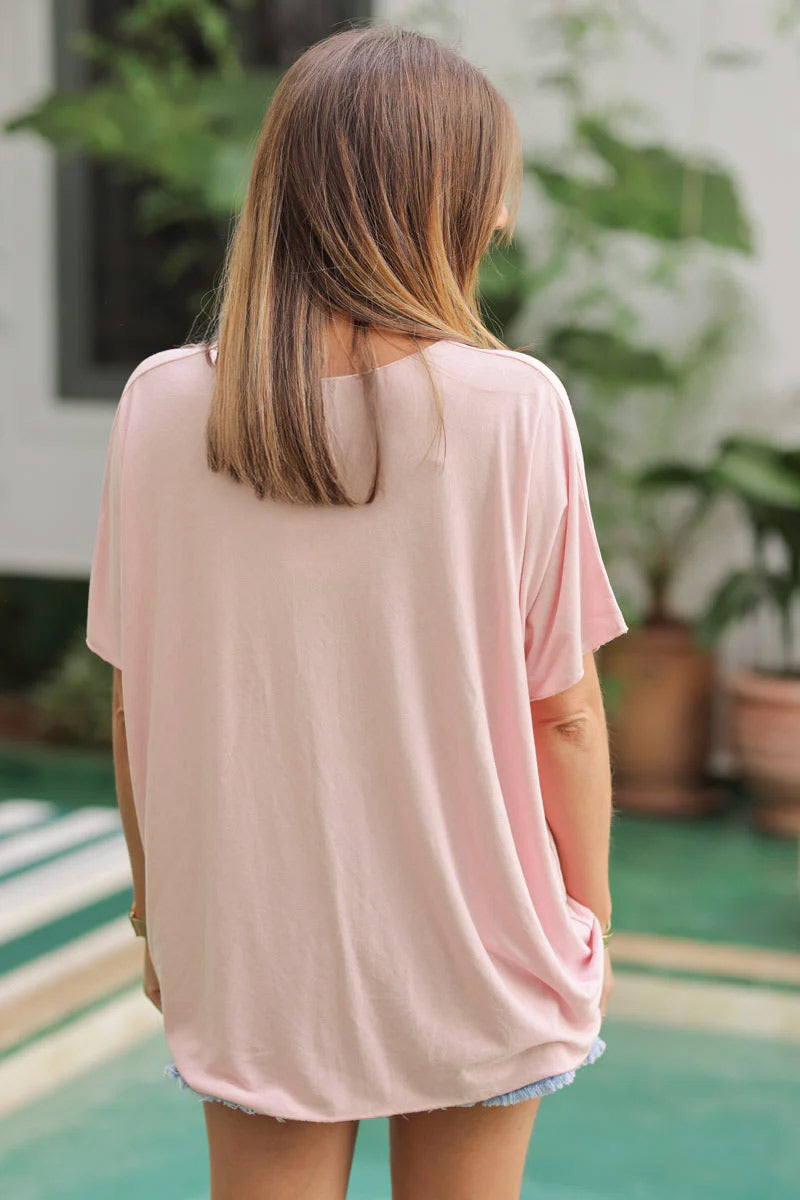 Top rose pâle fluide confort et stretch col v
