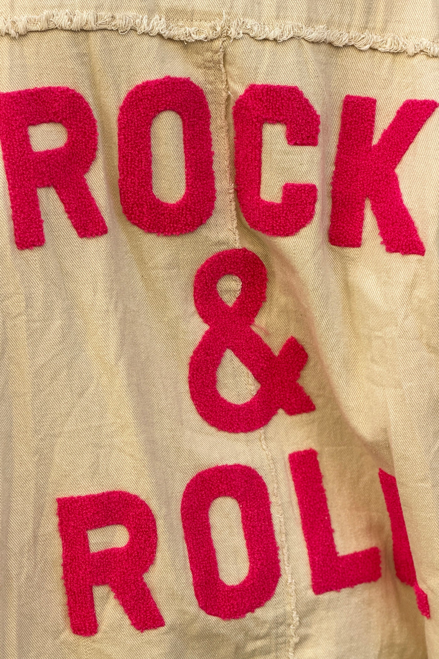 Beige denim oversized jacket 'ROCK AND ROLL' in Fuchsia with raw seams